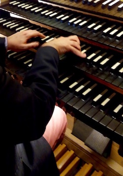 Alexander Ffinch playing the organ